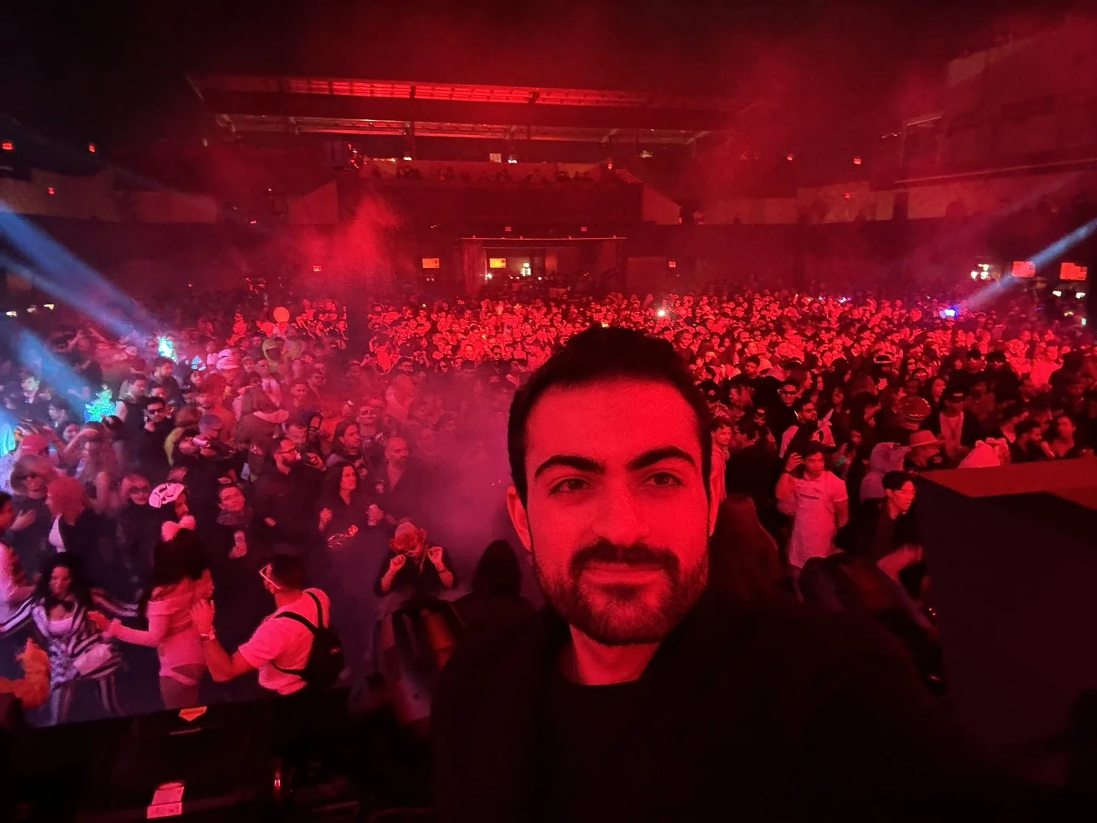 Arick Manocha in front of a large event crowd